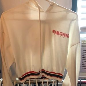 A crop white sweater